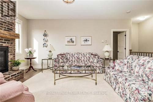 342 Pinehill Road, North Grenville, ON - Indoor Photo Showing Living Room With Fireplace