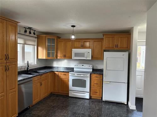 68 5Th Street Ne, Hamiota, MB - Indoor Photo Showing Kitchen With Double Sink