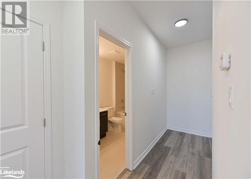 Corridor featuring dark hardwood / wood-style flooring - 25 Wyn Wood Lane, Orillia, ON - Indoor Photo Showing Other Room