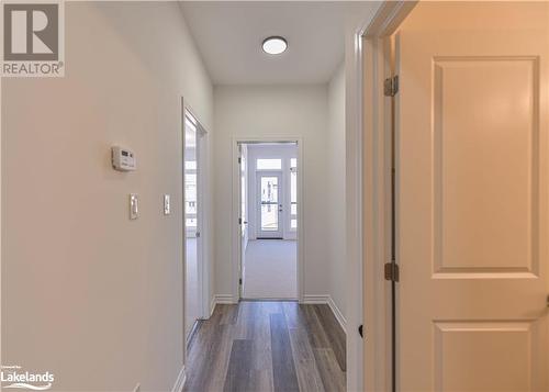 Corridor with dark wood-type flooring - 25 Wyn Wood Lane, Orillia, ON - Indoor Photo Showing Other Room