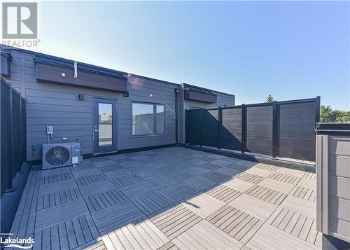 View of patio / terrace with ac unit - 25 Wyn Wood Lane, Orillia, ON - Outdoor With Exterior