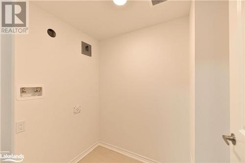 Laundry area with washer hookup - 25 Wyn Wood Lane, Orillia, ON - Indoor Photo Showing Other Room