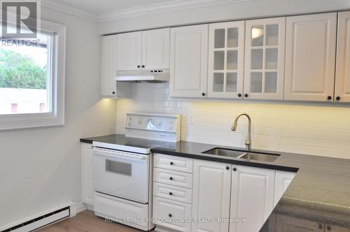 5 - 2056 Marine Drive, Oakville, ON - Indoor Photo Showing Kitchen With Double Sink