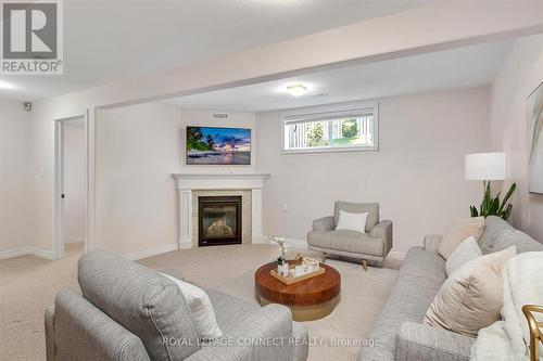 94 - 301 Carnegie Avenue, Peterborough, ON - Indoor Photo Showing Living Room With Fireplace