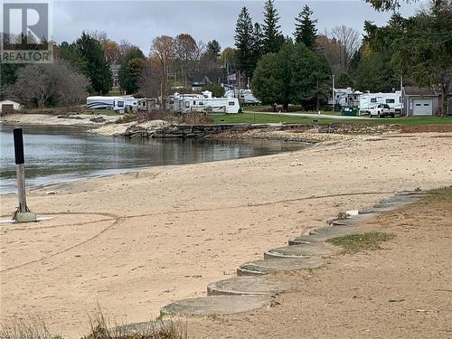 TRAILER PARK AND BEACH - 2 John Street, Lions Head, ON - Outdoor With Body Of Water With View