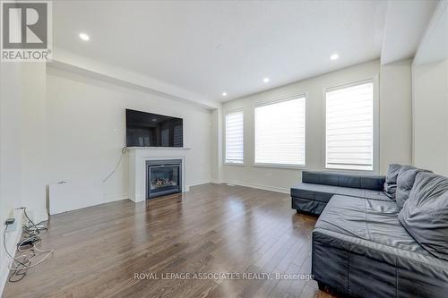 72 Auckland Drive E, Whitby, ON - Indoor Photo Showing Living Room With Fireplace