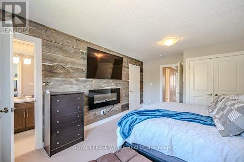 2 - 192 Brewery Street, Wilmot, ON - Indoor Photo Showing Bedroom With Fireplace