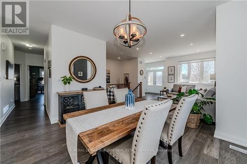 781 South Coast Drive, Haldimand, ON - Indoor Photo Showing Dining Room With Fireplace