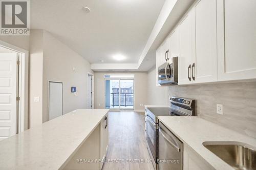 302 - 480 Gordon Krantz Avenue, Milton, ON - Indoor Photo Showing Kitchen With Upgraded Kitchen