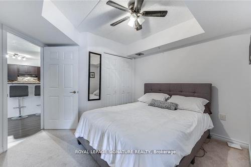 208-1340 Main St E, Milton, ON - Indoor Photo Showing Bedroom