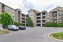 208-1340 Main St E, Milton, ON  - Outdoor With Balcony With Facade 