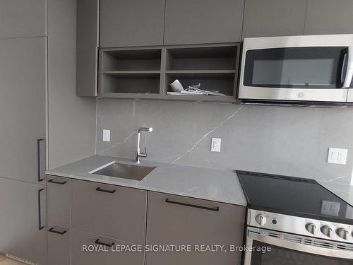 701-135 East Liberty St, Toronto, ON - Indoor Photo Showing Kitchen With Double Sink