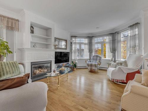 Salon - 1262 Rue Gaston-Miron, Lévis (Desjardins), QC - Indoor Photo Showing Living Room With Fireplace