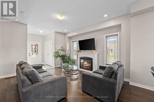 8 Pollock Avenue, Brock, ON - Indoor Photo Showing Living Room With Fireplace