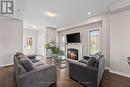 8 Pollock Avenue, Brock, ON  - Indoor Photo Showing Living Room With Fireplace 