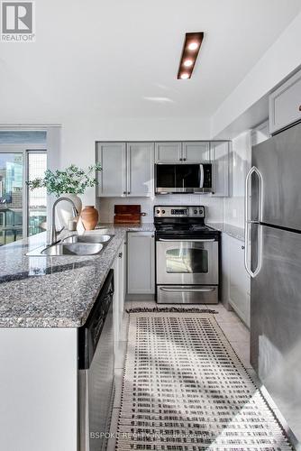 2702 - 30 Grand Trunk Crescent, Toronto, ON - Indoor Photo Showing Kitchen With Double Sink