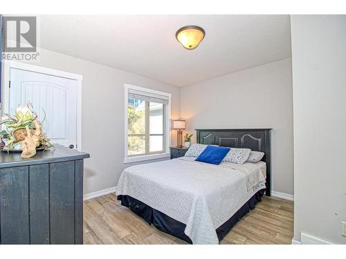 6895 Santiago Loop Unit# 101, Kelowna, BC - Indoor Photo Showing Bedroom