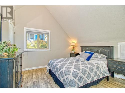 6895 Santiago Loop Unit# 101, Kelowna, BC - Indoor Photo Showing Bedroom