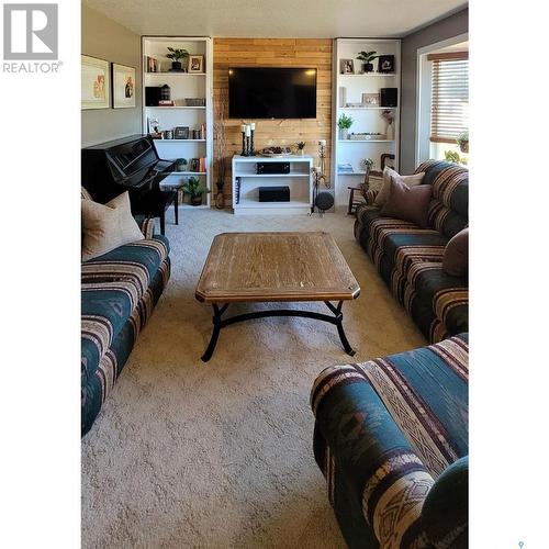 704 Railway Avenue, Loon Lake, SK - Indoor Photo Showing Living Room With Fireplace