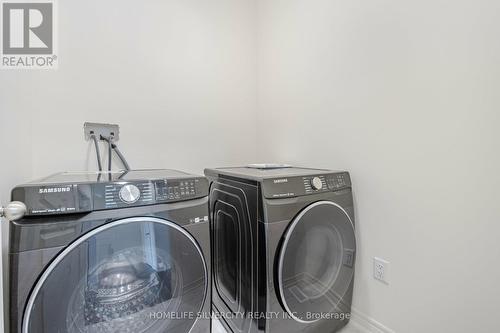 24 Dumaine Street, Whitby, ON - Indoor Photo Showing Laundry Room