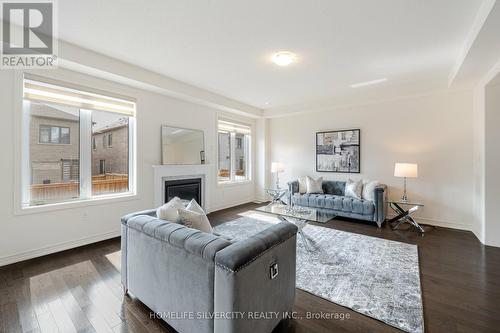 24 Dumaine Street, Whitby, ON - Indoor Photo Showing Living Room With Fireplace