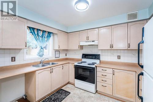 931 Montreal Street, Midland, ON - Indoor Photo Showing Kitchen With Double Sink