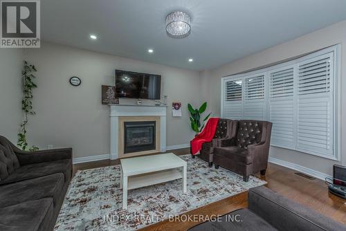 70 Zanetta Crescent, Brampton, ON - Indoor Photo Showing Living Room With Fireplace