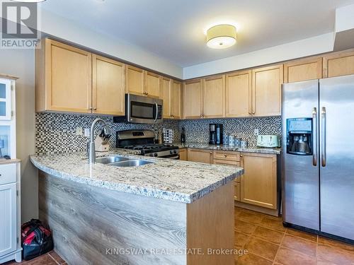 20 - 619 Evans Avenue, Toronto, ON - Indoor Photo Showing Kitchen With Double Sink