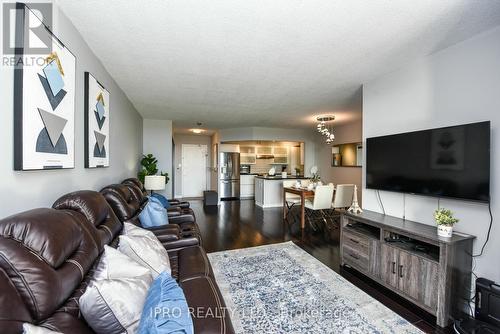 1411 - 3605 Kariya Drive, Mississauga, ON - Indoor Photo Showing Living Room