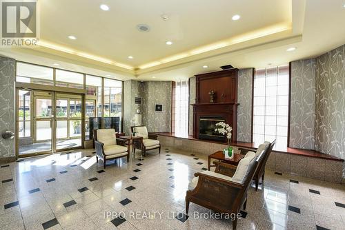 1411 - 3605 Kariya Drive, Mississauga, ON - Indoor With Fireplace