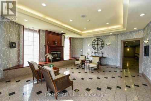 1411 - 3605 Kariya Drive, Mississauga, ON - Indoor With Fireplace