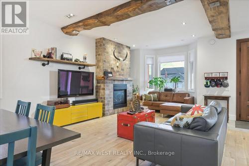 84 Ellins Avenue, Toronto, ON - Indoor Photo Showing Living Room With Fireplace