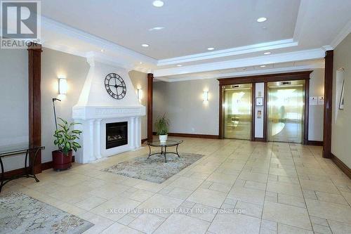 1406 - 2545 Erin Centre Boulevard, Mississauga, ON - Indoor Photo Showing Other Room With Fireplace