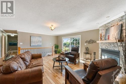 2586 Wilhaven Drive, Cumberland, ON - Indoor Photo Showing Living Room With Fireplace