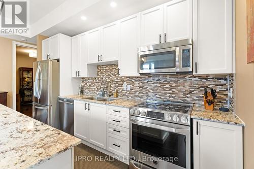 201 - 764 River Road E, Wasaga Beach, ON - Indoor Photo Showing Kitchen With Double Sink With Upgraded Kitchen