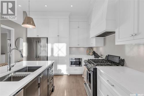 312 408 Cartwright Street, Saskatoon, SK - Indoor Photo Showing Kitchen With Double Sink With Upgraded Kitchen