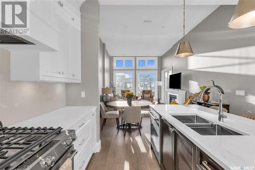 312 408 Cartwright Street, Saskatoon, SK - Indoor Photo Showing Kitchen With Double Sink With Upgraded Kitchen