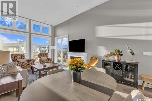 312 408 Cartwright Street, Saskatoon, SK - Indoor Photo Showing Living Room With Fireplace