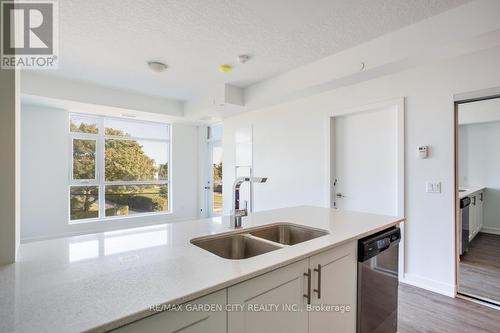 216 - 600 North Service Road, Hamilton, ON - Indoor Photo Showing Kitchen With Double Sink