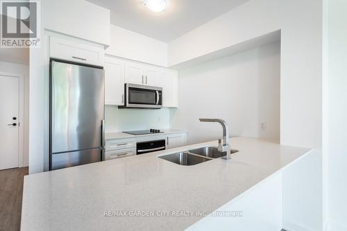 216 - 600 North Service Road, Hamilton, ON - Indoor Photo Showing Kitchen With Double Sink With Upgraded Kitchen