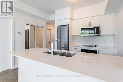 216 - 600 North Service Road, Hamilton, ON - Indoor Photo Showing Kitchen With Double Sink With Upgraded Kitchen