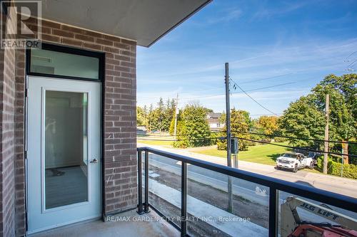 216 - 600 North Service Road, Hamilton, ON - Outdoor With Balcony With Exterior