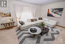 Living Room- virtually staged - 203 Shirley Avenue, Cornwall, ON  - Indoor Photo Showing Living Room 