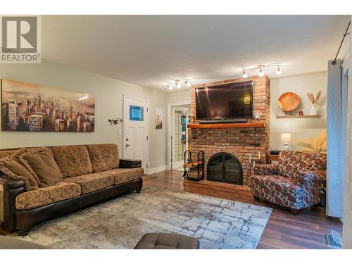 506 201St Avenue, Castlegar, BC - Indoor Photo Showing Living Room With Fireplace