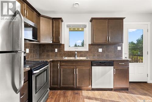 118 1210 Empress Street, Regina, SK - Indoor Photo Showing Kitchen With Double Sink