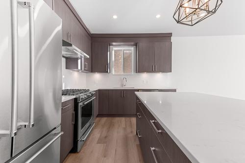 102-1715 Fairford Drive, Penticton, BC - Indoor Photo Showing Kitchen With Stainless Steel Kitchen With Upgraded Kitchen