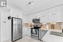 325 - 28 Prince Regent Street, Markham, ON  - Indoor Photo Showing Kitchen With Stainless Steel Kitchen With Double Sink With Upgraded Kitchen 