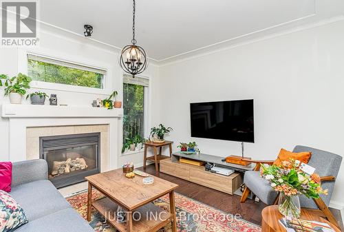 2225 Amberglen Court, Oakville, ON - Indoor Photo Showing Living Room With Fireplace