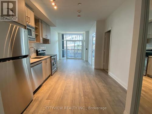 317 - 60 George Butchart Drive, Toronto, ON - Indoor Photo Showing Kitchen