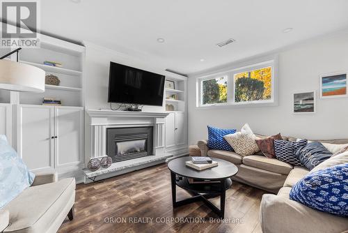 2 Ashmount Crescent, Toronto, ON - Indoor Photo Showing Living Room With Fireplace